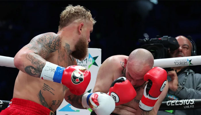 Jake Paul (left) ends Ryan Bourland against the ropes. — AFP/File