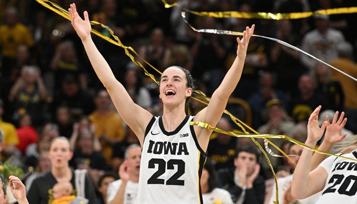 Iowa Hawkeyes guard Caitlin Clark (22) reacts during senior day after the game against the Ohio State Buckeyes. Clark broke the NCAA basketball all-time scoring record during the second quarter in Iowa City, Iowa, US on March 3, 2024. — Reuters