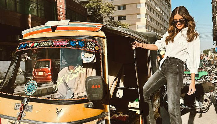 Australian cricket presenter Erin Holland seen with a rickshaw in this photo. — Instagram/erinvholland