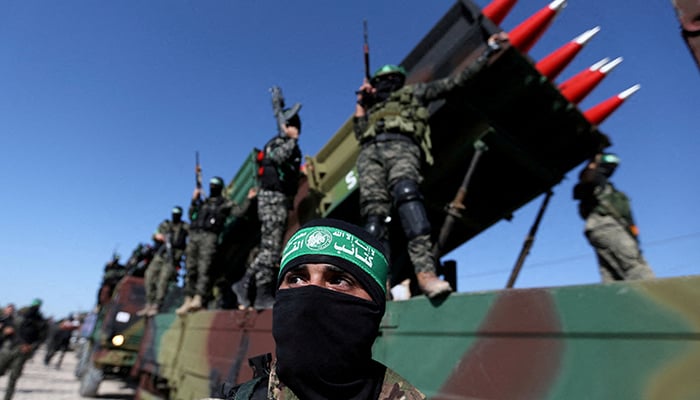 Palestinian Hamas attend an anti-Israel rally in Khan Younis, in the southern Gaza Strip. — Reuters