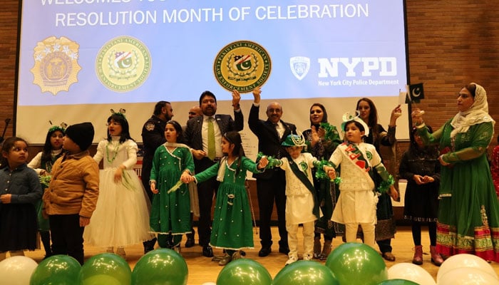 Ambassador Masood Khan cheers alongside the Pakistani community during the NYPD event. — Embassy of Pakistan