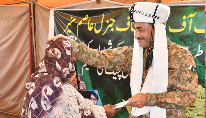 Chief of Army Staff (COAS) General Asim Munir meets elderly people during his visit to the Awaran district of Balochistan on March 8, 2024. — ISPR