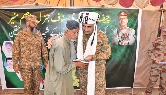 Chief of Army Staff (COAS) General Asim Munir meets elderly people during his visit to the Awaran district of Balochistan on March 8, 2024. — ISPR