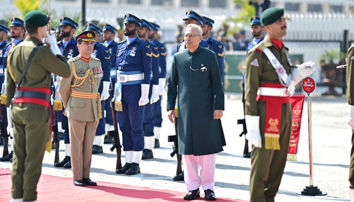 President Dr Arif Alvi is being presented with a farewell guard of honour in Islamabad on March 8, 2024. — @PresOfPakistan/X