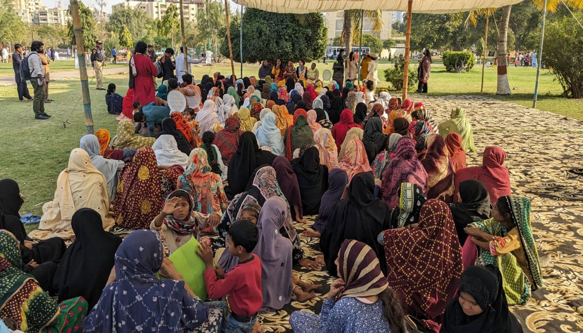 Women at the Aurat March 2024 participating in a session about the economic autonomy of women at Frere Hall Karachi on March 8, 2024. — Author