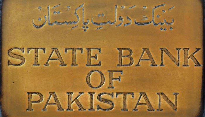 A brass plaque of the State Bank of Pakistan is seen outside of its wall in Karachi, Pakistan December 5, 2018.