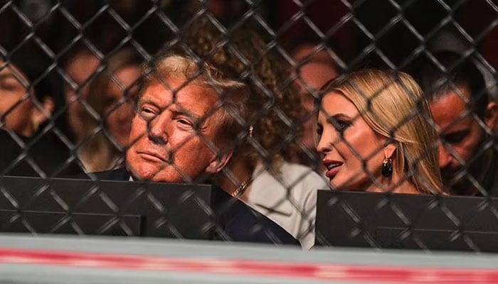 Donald Trump and his daughter Ivanka Trump talk with each other while attending UFC 299 in Miami, Florida, US on March 9, 2024. — AFP