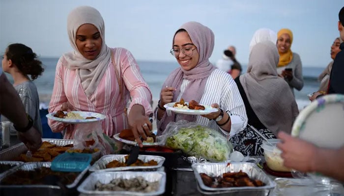 Muslim American friends take part in an iftar in Long Branch, New Jersey, US, June 24, 2017. — Reuters