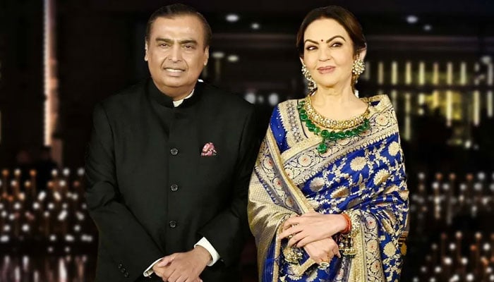 This undated image shows Centibillionaire Mukesh Ambani posing with wife Nita Ambani. — GQ Magazine