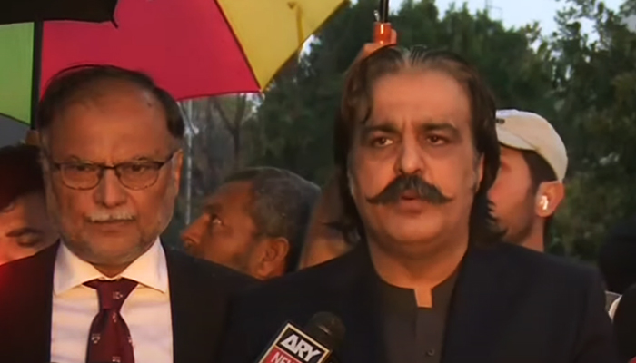 Khyber Pakhtunkhwa Chief Minister Ali Amin Gandapur (centre) speaks to media in Islamabad, on March 13, 2024, in this still taken from a video. — Geo News