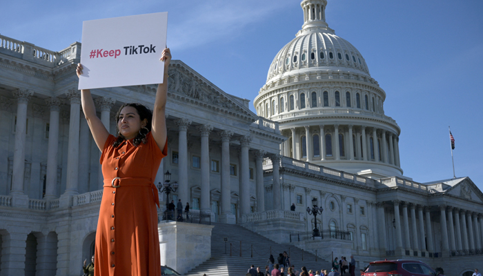 A demonstrator outside the US Capitol following a press conference by TikTok creators to voice their opposition to an Act pending crackdown legislation on TikTok in the House of Reps on Capitol Hill in Washington on March 12, 2024. — Reuters