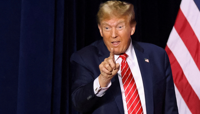 Republican presidential candidate and former President Donald Trump gestures to supporters during a campaign rally at the Forum River Center in Rome, Georgia on March 9, 2024. — Reuters