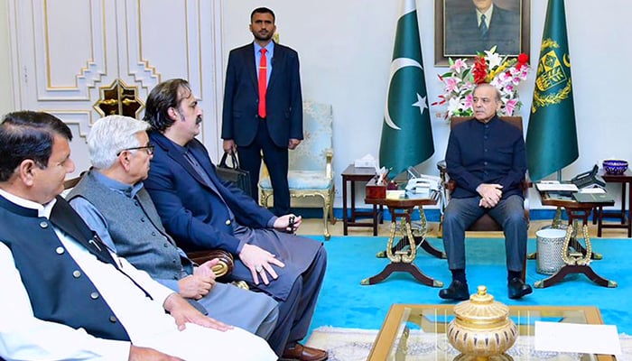 Prime Minister Shehbaz Sharif (right) meets Khyber Pakhtunkhwa Chief Minister Ali Amin Gandapur (third left) in Islamabad, on March 13, 2024. — APP