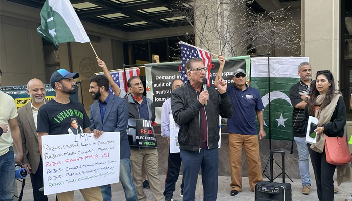 Sajjad Burki (centre), PTI USAs spokesperson, speaks during the PTI protest outside IMF headquarters in Washington, USA on March 15, 2024. — X/@FirstPakGlobal