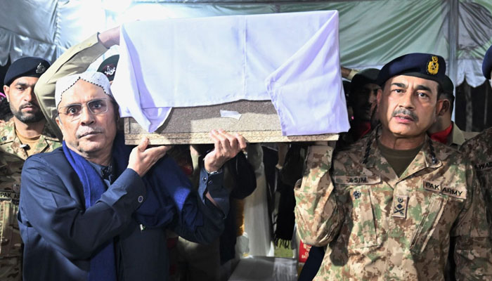 President Asif Ali Zardari (left) and COAS General Asim Munir carry the body of a martyred soldier after offering funeral prayers at Rawalpindis Chaklala Garrison on March 16, 2024. — X/PTVNewsOfficial