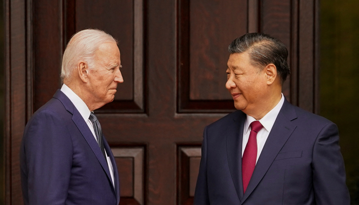 US President Joe Biden (left) and Chinese President Xi Jinping greet each other. — Reuters/File