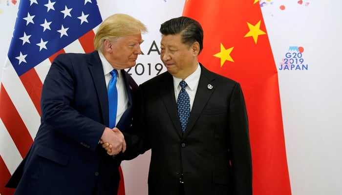 Former president Donald Trump shakes hands with Chinas President Xi Jinping before starting their bilateral meeting during the G20 leaders summit in Osaka, Japan, June 29, 2019. — Reuters