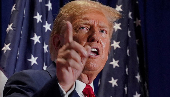 Former President Donald Trump gestures during a campaign rally on March 2 in Richmond, Virginia on March 2, 2024. — Reuters