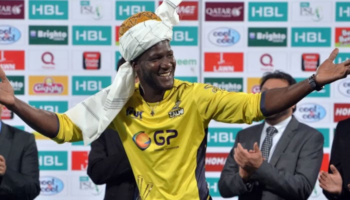 Peshawar Zalmis Darren Sammy gestures in a post match ceremony during the PSL. — AFP/File