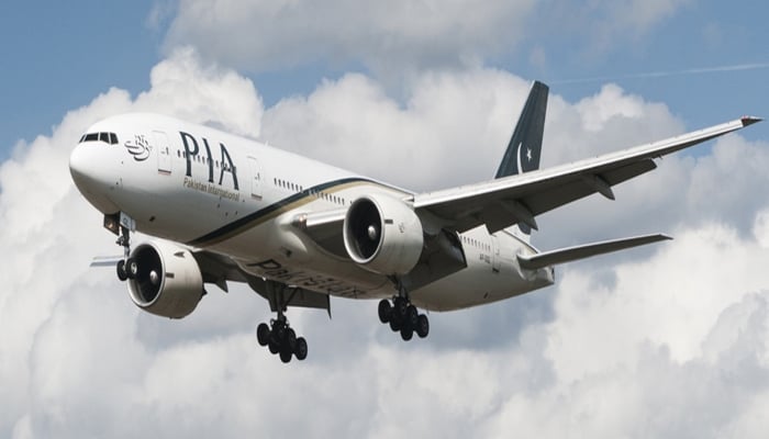 Image of a Pakistan International Airline (PIA) aircraft flying in the air. —APP
