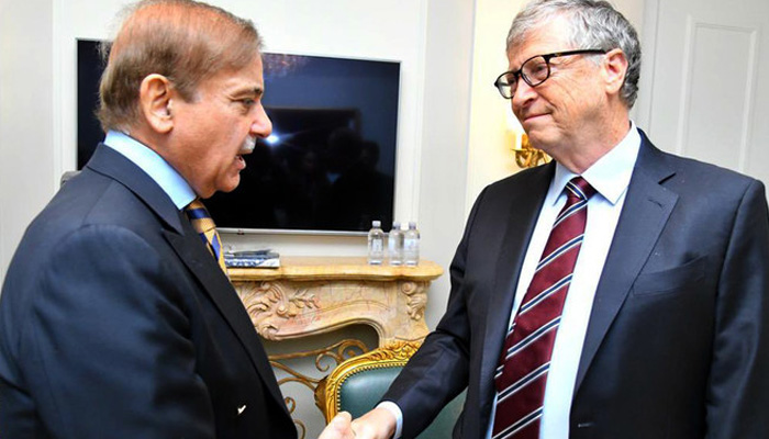 Prime Minister Shehbaz Sharif shakes hands with philanthropist Bill Gates during the sidelines of the United Nations General Assembly in New York on September 22, 2022. — PMO