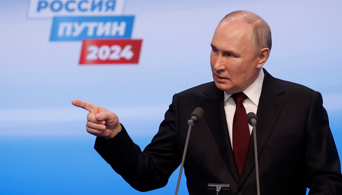 Russian presidential candidate and incumbent President Vladimir Putin speaks after polling stations closed, in Moscow, Russia on March 18, 2024. — Reuters