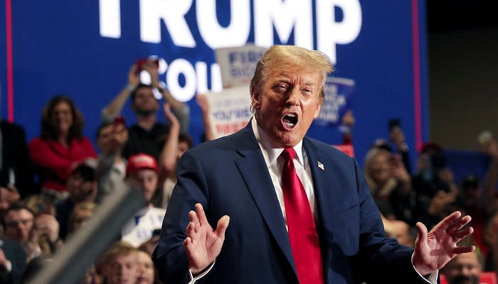 Republican presidential candidate and former president Donald Trump gestures on stage during a campaign rally in Richmond, Virginia on March 2, 2024. — Reuters
