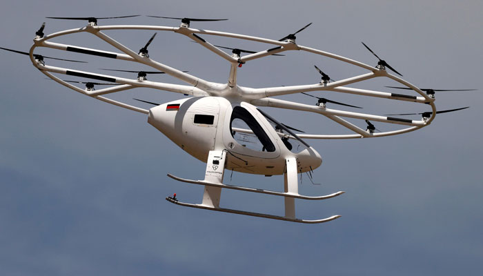 A prototype of an electrical air-taxi drone by German start-up Volocopter that takes off and lands vertically performs a non-passenger flight over Le Bourget airport, near Paris, France, June 21, 2021. — Reuters