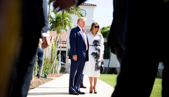 Donald Trump and Melania Trump in Florida on March 19, 2024. Her last appearance with Trump was at her mother’s funeral.  — Reuters