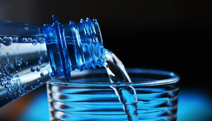 A representational of water being poured into a glass. Researchers reveal 75% of houses are contaminated with brain-damaging toxic metal. — Pexels