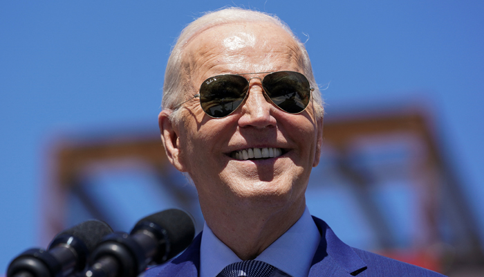 President Joe Biden smiles during a visit to the Intel Ocotillo Campus, in Chandler, Arizona on March 20, 2024. — Reuters