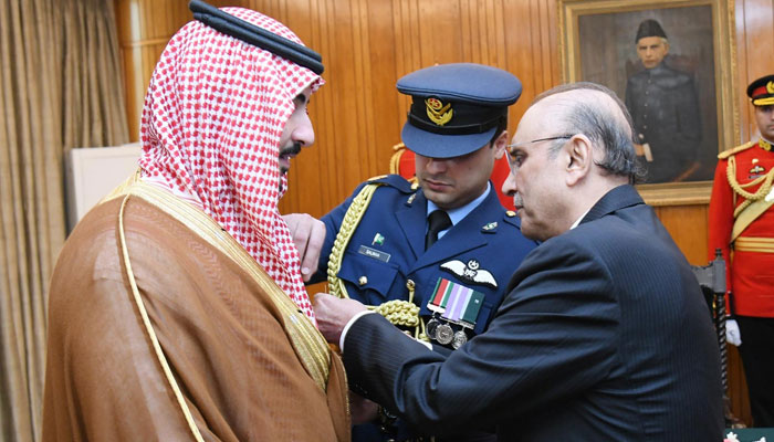 President Asif Ali Zardari (right) conferred Nishan-i-Pakistan award on Saudi Arabias Defence Minister Prince Khalid bin Salman Al Saud on March 23, 2024. — PID