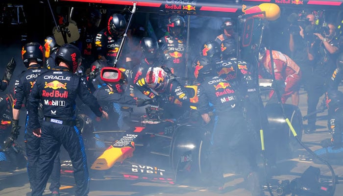 Red Bulls Max Verstappen returns to the pit stop after retiring from the race due to fire during Formula One Australian Grand Prix at Melbourne Grand Prix Circuit, Melbourne, Australia on March 24, 2024. — Reuters