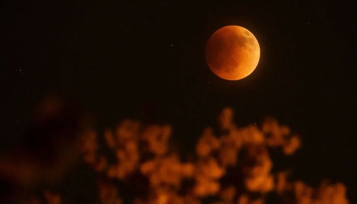 The moon glows red over Columbus, Ohio in this undated image. — Reuters/File