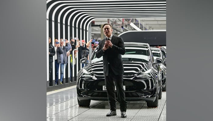 Elon Musk attend the opening ceremony of the new Tesla Gigafactory for electric cars in Gruenheide, Germany, March 22, 2022. — Reuters