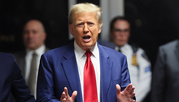 Donald Trump, former US president, speaks from the hallway outside a courtroom in New York City, on March 25, 2024. Donald Trump gets relief after court rules to reduce bond amount. — Reuters