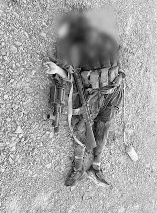 A blurred image of one of the killed terrorists. — ISPR