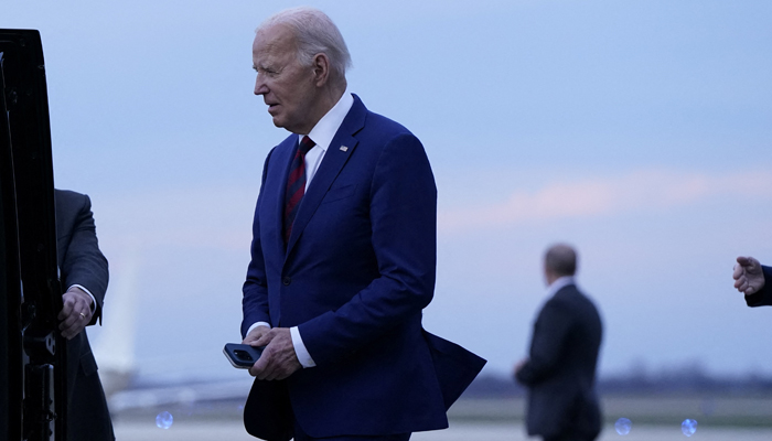 President Joe Biden walks on the tarmac after disembarking from Air Force One en route to Washington, at Joint Base Andrews, Maryland on March 26, 2024. — Reuters