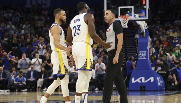 Golden State Warriors Forward Draymond Green (23) Talks To Referee Ray Acosta (54) After Receiving A Foul In The First Quarter At The Kia Center In Orlando, Florida, Us On March 27, 2024. — Reuters