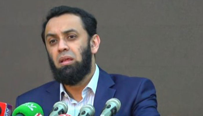Federal Minister for Information Attaullah Tarar addresses a press conference in Lahore on March 31, 2024. — Screengrab/YouTube/HUM News Live