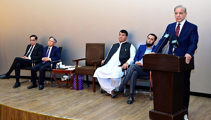 PM Shehbaz Sharif addresses the Chinese engineers and government officials at Kass camp of China Gazhouba Group Company (CGGC) working at the Dasu hydropower project on April 1, 2024. — PID