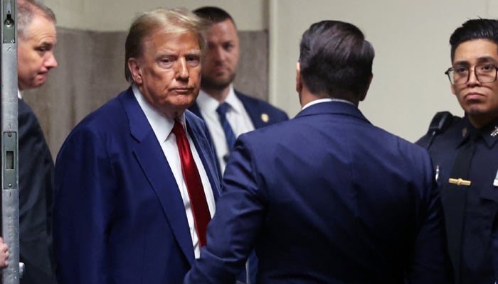 Former president Donald Trump leaves the court after a pre-trial hearing in New York City on March 25, 2024. Donald Trump quits presidential campaign in April Fools message. — Reuters