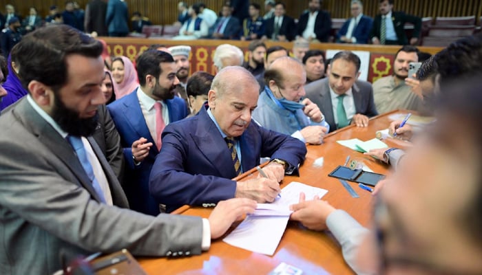 Prime Minister Shehbaz Sharif casting vote in Senate elections at Parliament House in Islamabad on April 2, 2024. — PID