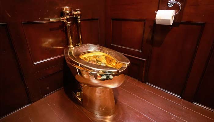 18k gold toilet stolen from Sir Winston Churchills ancestral home. — AFP/File