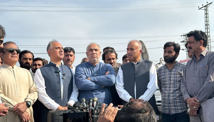 PTI leaders are addressing media in Rawalpindi after meeting PTI founder Imran Khan in jail on April 4, 2023. —X/@AsadQaiserPTI