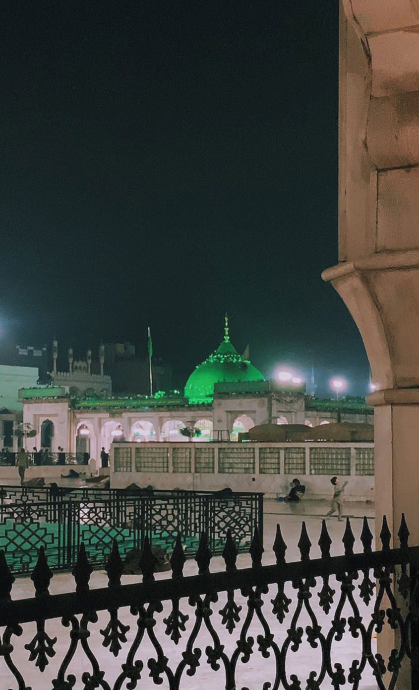 The Data Darbar shrine as seen from across the courtyard from the women’s side at night. — Photo by author