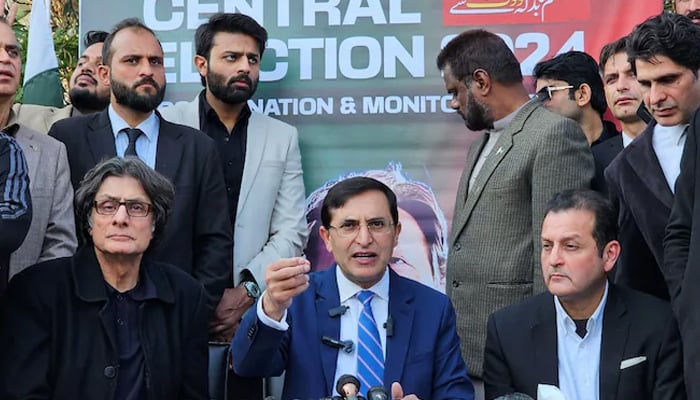 PTI Chairman Barrister Gohar Ali Khan addressing a press conference at the partys office in this undated photo. — Reuters