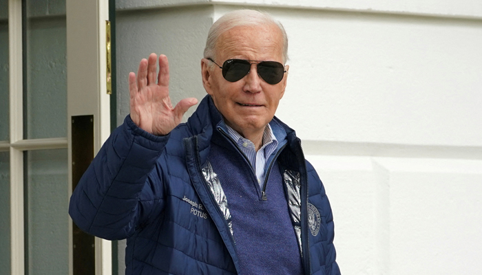 President Joe Biden waves as he departs for Baltimore from the White House in Washington on April 5, 2024. — Reuters
