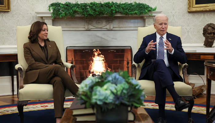 A vote for Joe Biden (R) and Kamala Harris (L) is a vote to restore Roe, says Biden campaign official. — Reuters