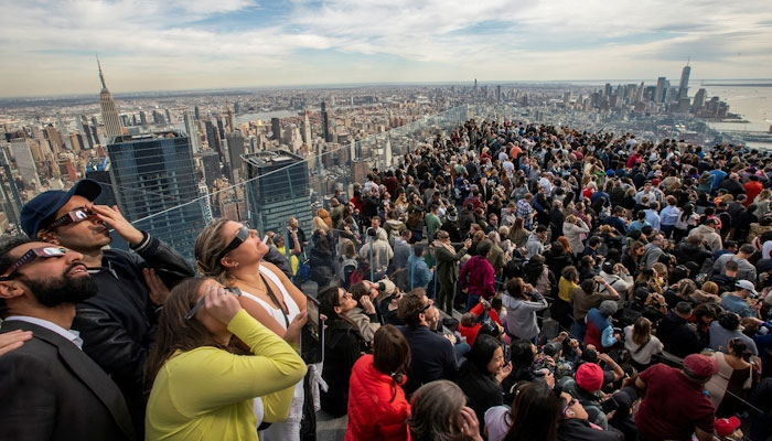 People watch from the observation deck of Edge at Hudson Yards in New York City, U.S., April 8, 2024. REUTERS